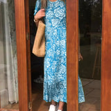 Marit | Lange jurk met korte mouwen en bloemenprint