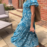 Marit | Lange jurk met korte mouwen en bloemenprint
