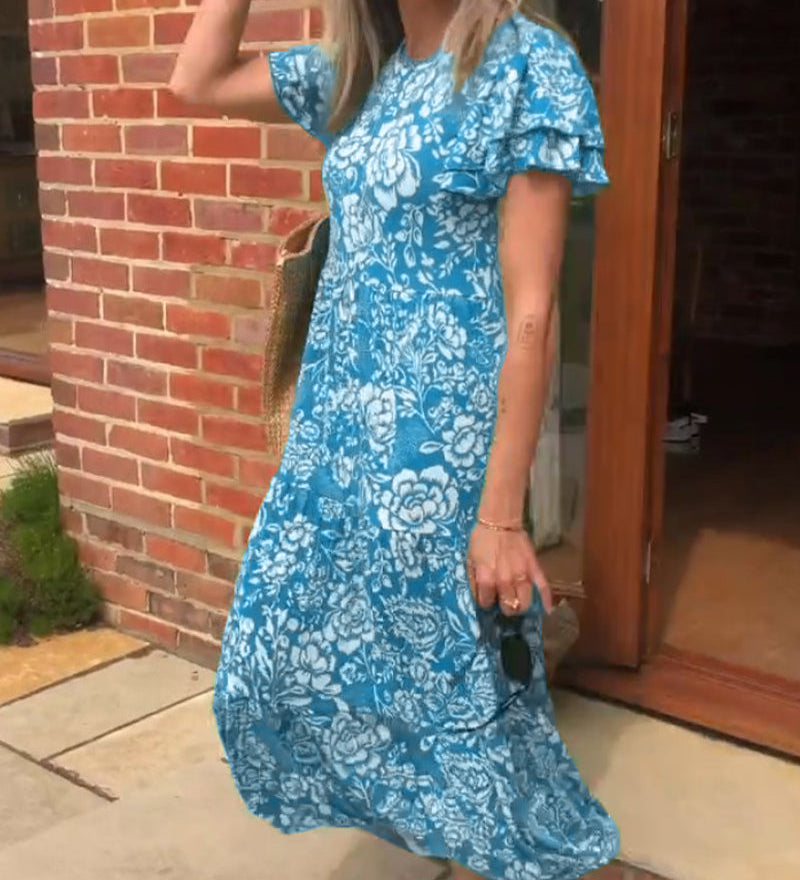Marit | Lange jurk met korte mouwen en bloemenprint