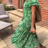 Marit | Lange jurk met korte mouwen en bloemenprint