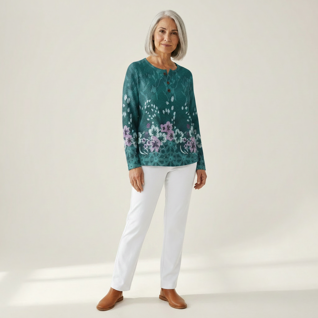 Roos - Trui in turquoise met bloemen - vooraanzicht