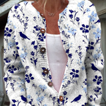 Birgit - Wit-blauw gebreid vest met bloemen & vogels