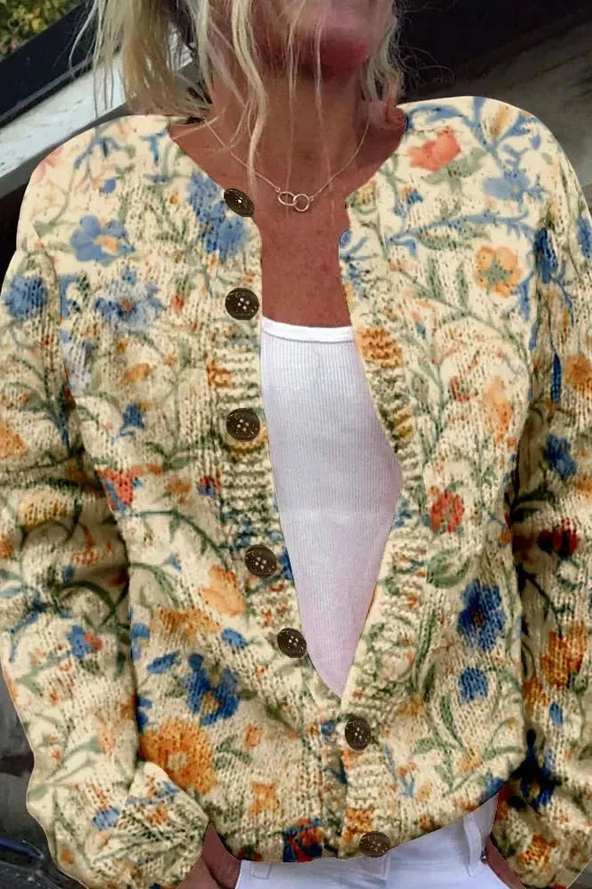 Cornelia - Crèmekleurig vest met bloemenpatroon