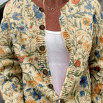 Cornelia - Crèmekleurig vest met bloemenpatroon