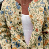 Cornelia - Crèmekleurig vest met bloemenpatroon