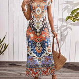 Elin | Kleurrijke casual jurk met print en splitten