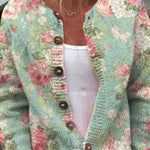 Christa - Saliegroen vest met rozenpatroon