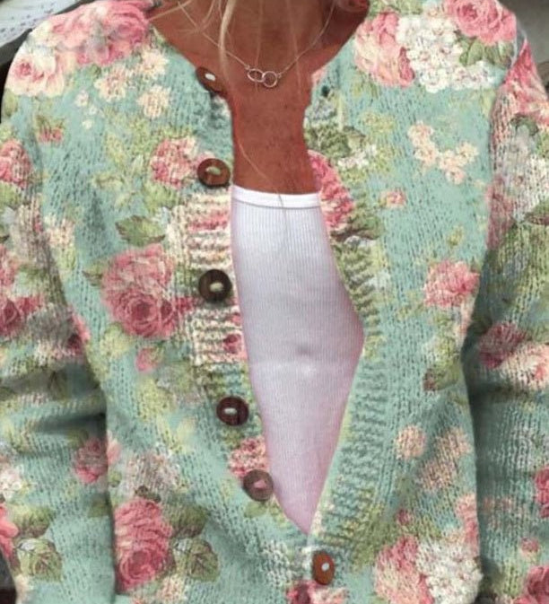 Christa - Saliegroen vest met rozenpatroon