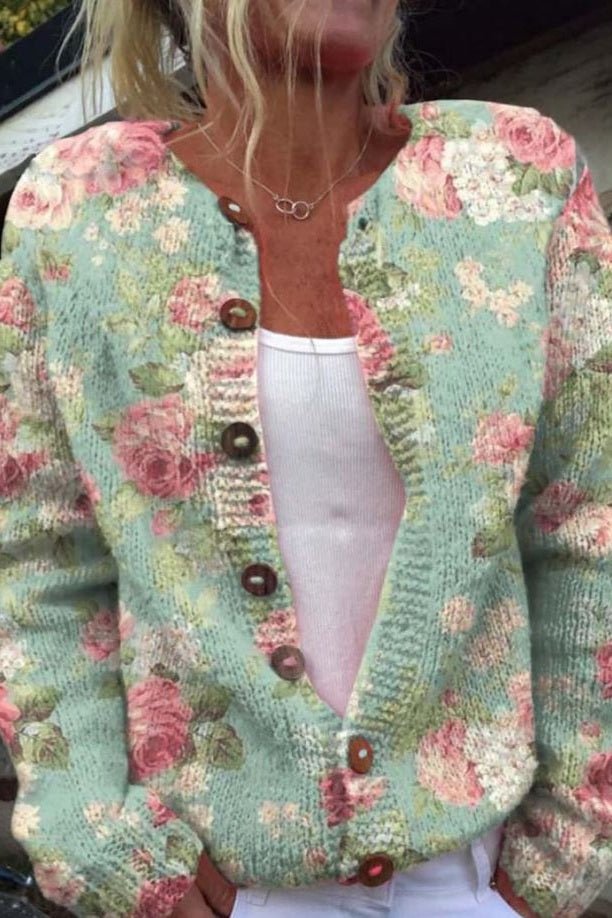 Christa - Saliegroen vest met rozenpatroon