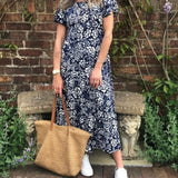 Marit | Lange jurk met korte mouwen en bloemenprint