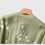 Nellie Elegante Top met Geborduurde Bloemen