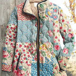 Viola - Gewatteerde patchworkjas met bloemenpatronen - productfoto