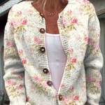 Petra - Crèmekleurig vest met roze bloemen