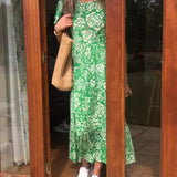 Marit | Lange jurk met korte mouwen en bloemenprint