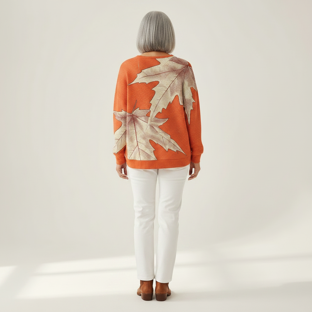 Marit - Trui in oranje met herfstbladeren - achteraanzicht