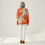 Marit - Trui in oranje met herfstbladeren - achteraanzicht