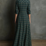 Lange jurk met groene geruite revers