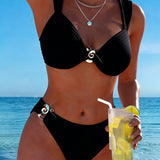 Bikini met verticale strepen en metalen gesp