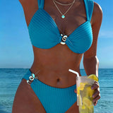 Bikini met verticale strepen en metalen gesp