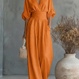 Élise - Elegante vloeiende jumpsuit - Oranje