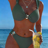 Bikini met verticale strepen en metalen gesp